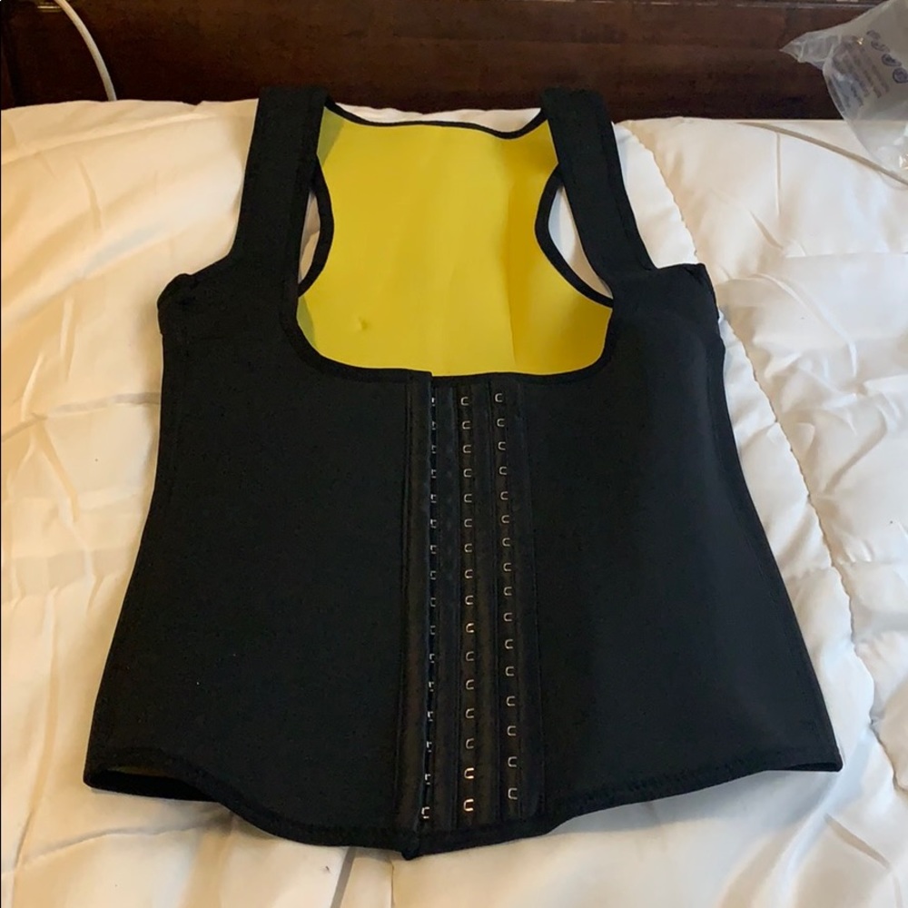 Size 0-2 (small) neoprene women’s sweat vest